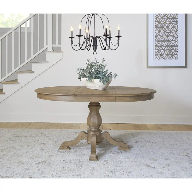Mesa de comedor redonda de pedestal Magnolia Manor con extensiones expandibles - 2 acabados