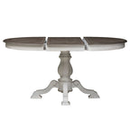 Mesa de comedor redonda de pedestal Magnolia Manor con extensiones expandibles - 2 acabados